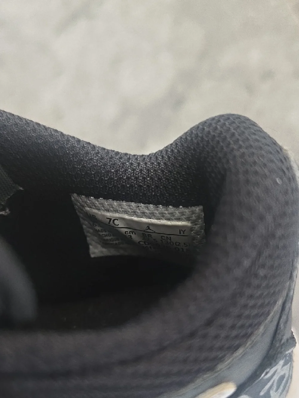 Nike Kids Black Sneakers with White Laces and Orange Logos - Picture 2 of 10